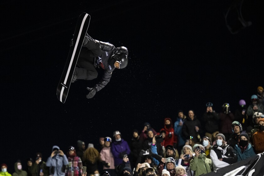 Shaun White flies in the air during the final run of the snowboard halfpipe competition at the Laax Open on Saturday.