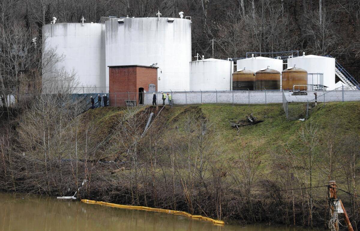 At least 7,500 gallons of a little-understood chemical known as MCHM spilled from these storage tanks into the Elk River northeast of downtown Charleston, W.Va., contaminating the water supply for 300,000 people.