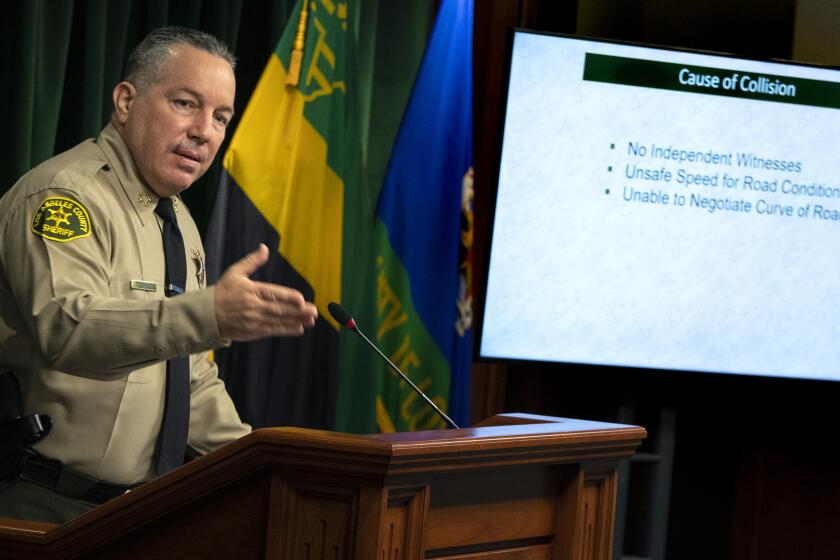 LOS ANGELES, CA - APRIL 07: Los Angeles County Sheriff Alex Villanueva gives reporters an update on the investigation into the crash that seriously injured pro golfer Tiger Woods, during a press conference at the Hall of Justice on Wednesday, April 7, 2021 in Los Angeles, CA. (Brian van der Brug / Los Angeles Times)