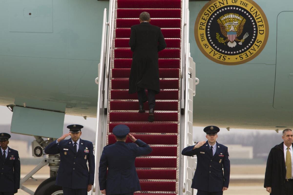 President Obama climbs the steps of Air Force One at Andrews Air Force Base outside Washington on Wednesday en route to Idaho, one of just four states he had yet to visit while in office.