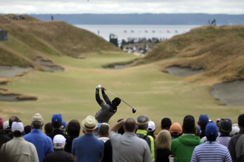 Jason Day, of Australia, watches his tee shot on the 10th hole during the second round of the U.S. Open golf tournament at Chambers Bay.