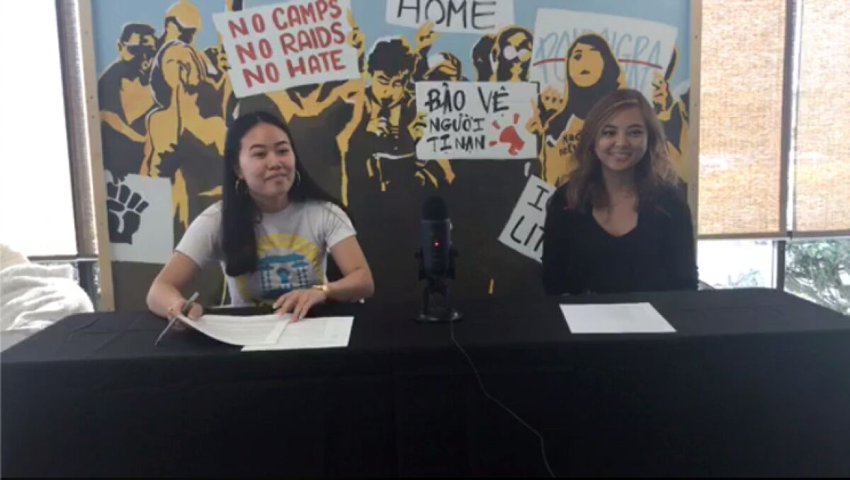 Allison Vo, left, and Tracy La, both of the Orange County-based activist group VietRISE, host a press conference on coronavirus' impact on Asian, Latin and immigrant communities.