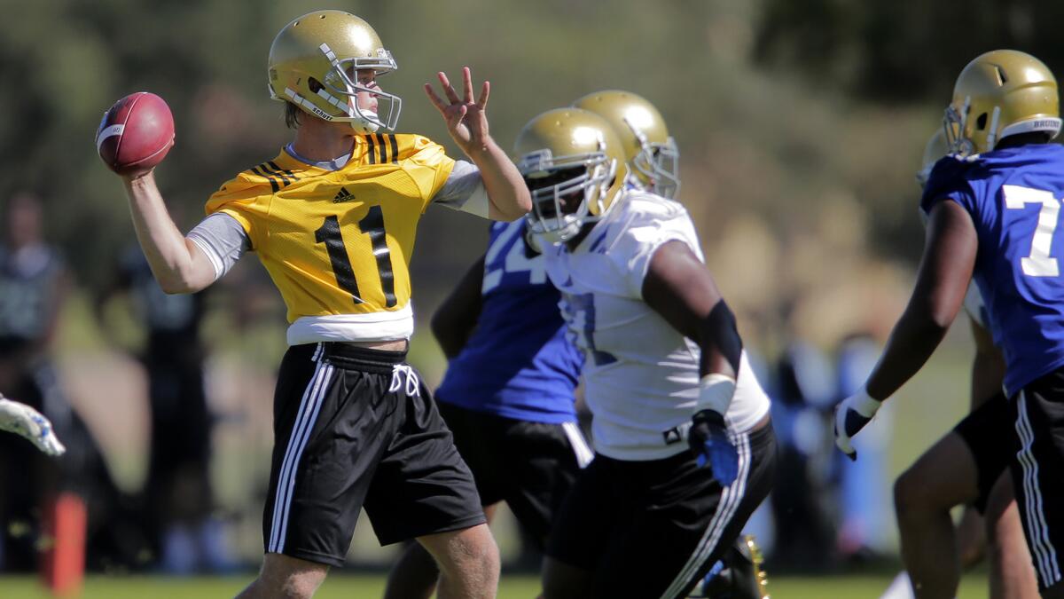 UCLA quarterback Jerry Neuheisel, shown during the first day of summer camp, had a big day in seven-on-seven drills on Tuesday.