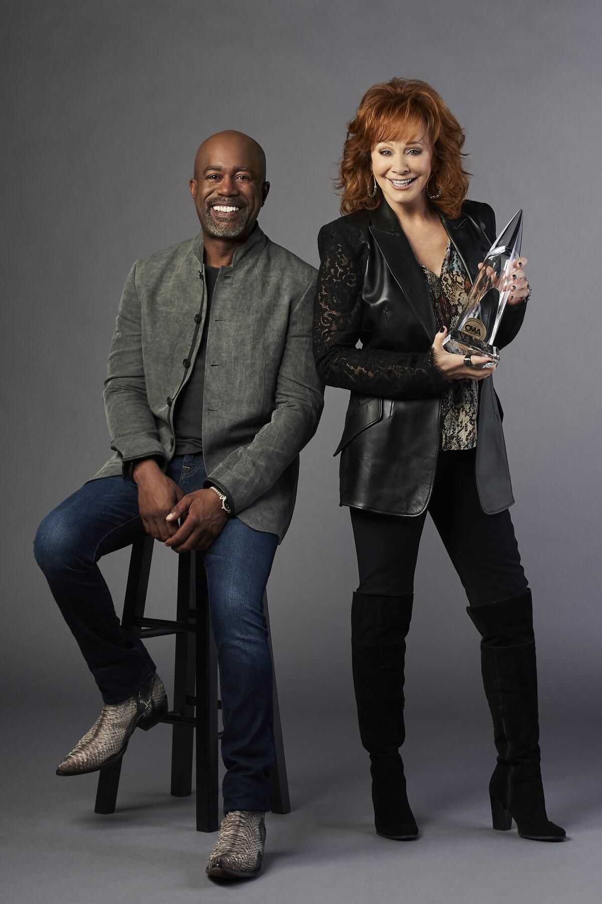 Country music stars Darius Rucker and Reba McEntire