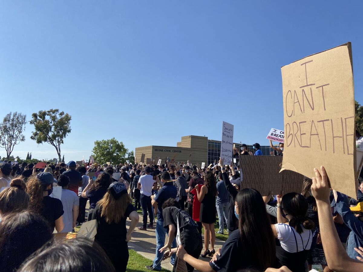 Hundreds attended a protest against the death of George Floyd in Minneapolis outside Irvine City Hall on Wednesday.