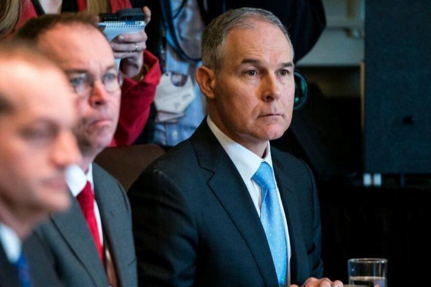 Mandatory Credit: Photo by JIM LO SCALZO/EPA-EFE/REX/Shutterstock (9593787a) Scott Pruitt EPA Chief Pruitt attends cabinet meeting at the White House, Washington, USA - 09 Apr 2018 Environmental Protection Agency (EPA) Chief Scott Pruitt listens to US President Donald J. Trump speak to the media before a meeting with his cabinet in the Cabinet Room of the White House in Washington DC, USA, 09 April 2018. Pruitt is facing growing scrutiny over numerous ethical issues, including his spending at the agency and his living arrangements. ** Usable by LA, CT and MoD ONLY **