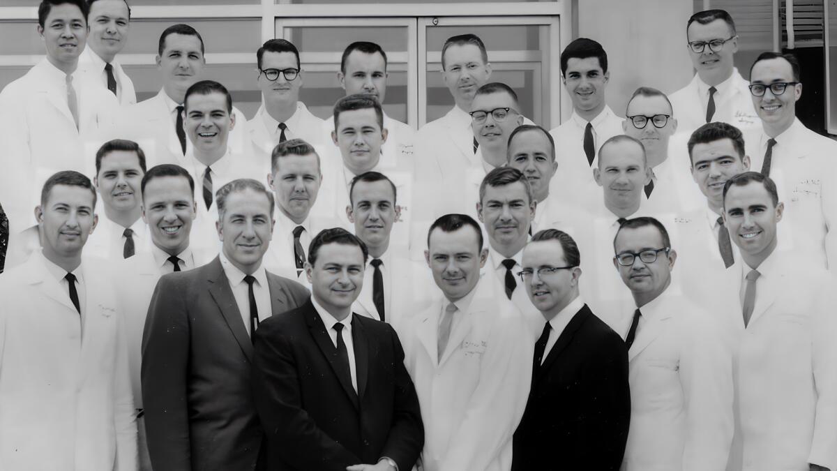 A black and white photo of the surgery staff at Dallas' Parkland Hospital in the 1960s.