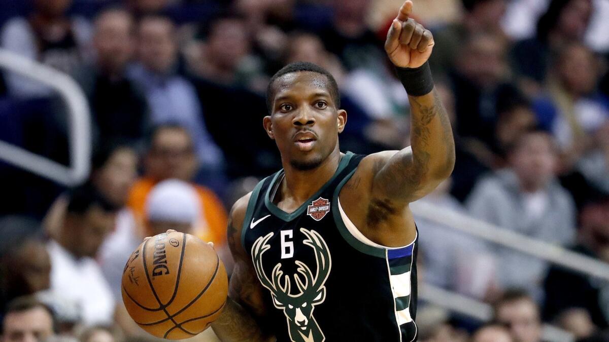 Milwaukee Bucks guard Eric Bledsoe calls a play during a game against the Suns on March 4 in Phoenix.