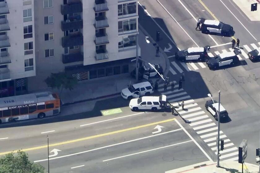 Law enforcement responds to a report of an armed suspect on a bus in Glendale on July 1.