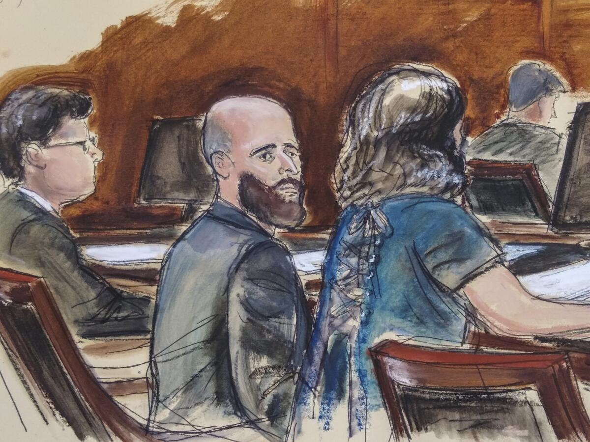 A courtroom sketch of Joshua Schulte seated in a New York court.