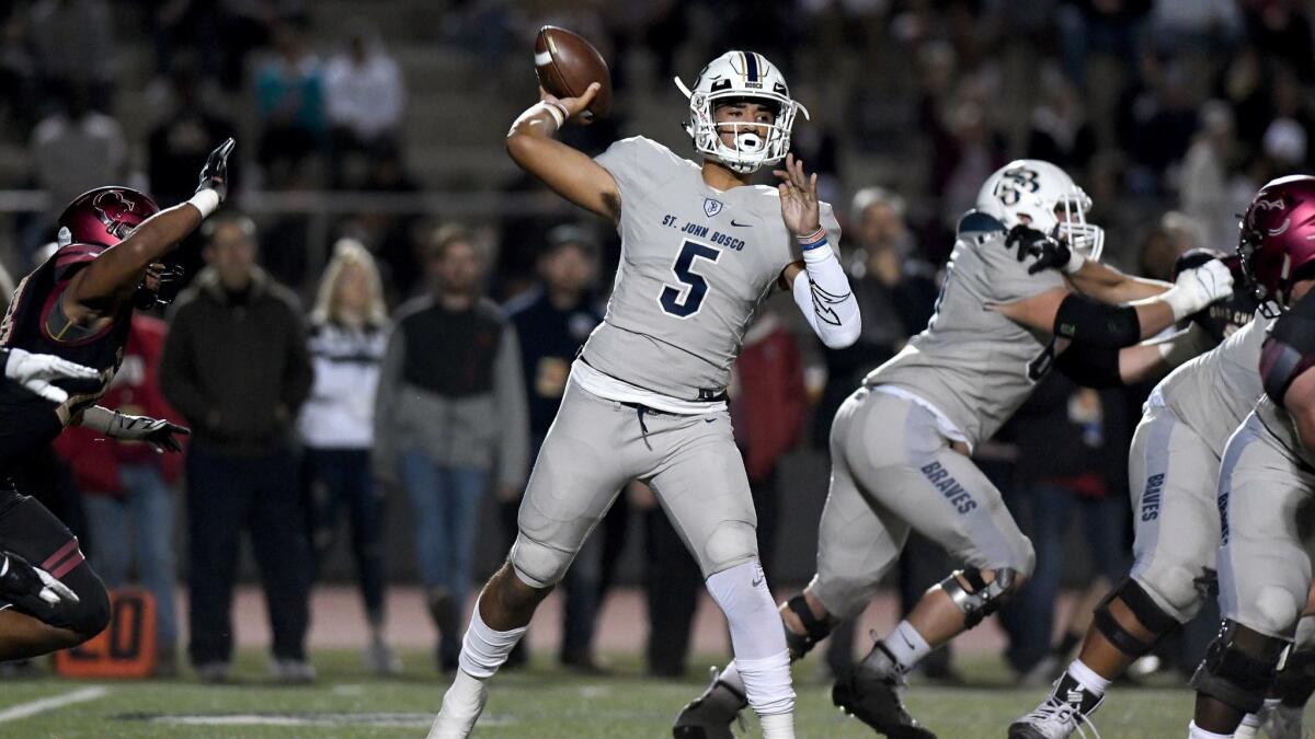 St. John Bosco quarterback DJ Uiagalelei passes against Oaks Christian during a Division 1 semifinal at Royal High School in Simi Valley.