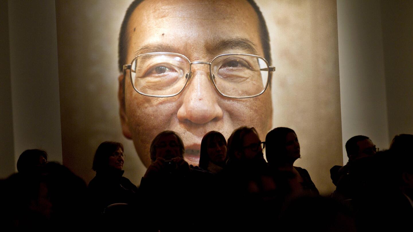 A picture of Liu Xiaobo, who is imprisoned in China, is seen inside the Nobel Peace Center in Oslo on Dec. 10, 2010.