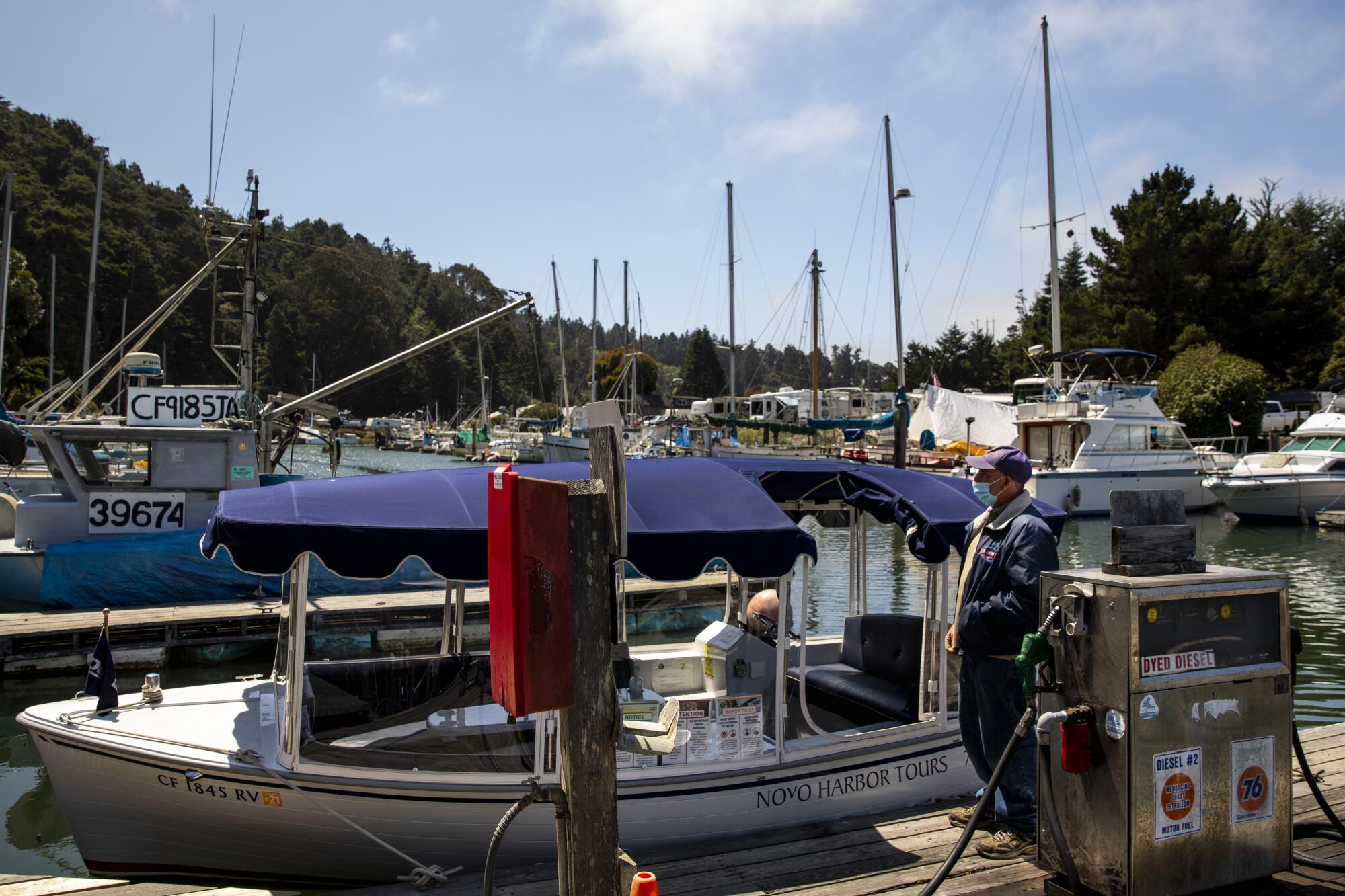 Dan Platt, owner of Noyo Harbor Tours, waits for clients