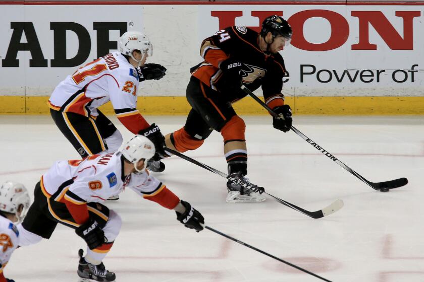 Ducks defenseman Simon Despres gets off a shot against the Flames in the second period of Game 2.