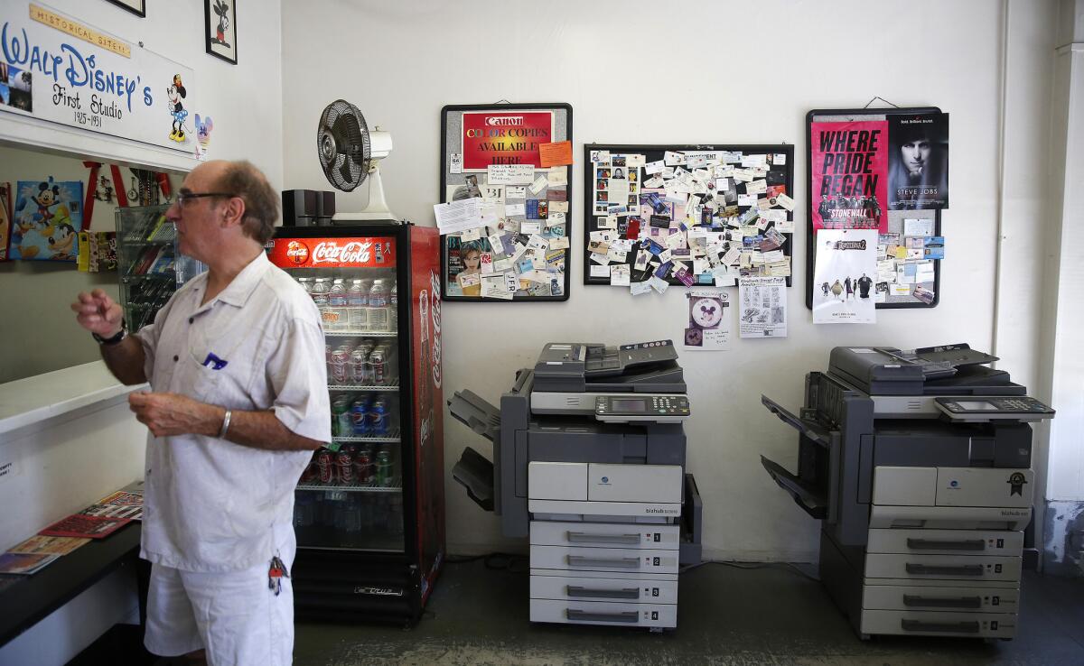 At Extra Copy in Los Feliz, the walls are covered in images of Disney characters and other items honoring the building's history.