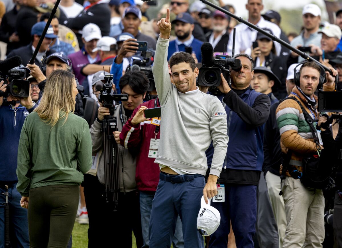 Joaquin Niemann acknowledges the crowd after winning the Genesis Invitational at Riviera Country Club on Sunday.