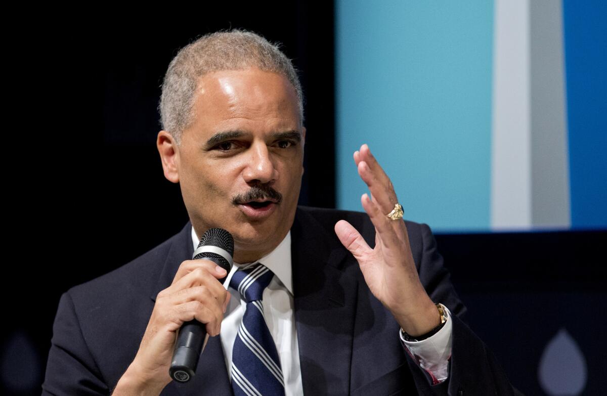 U.S. Atty. Gen. Eric H. Holder Jr. speaks at the sixth annual Washington Ideas Forum in Washington.