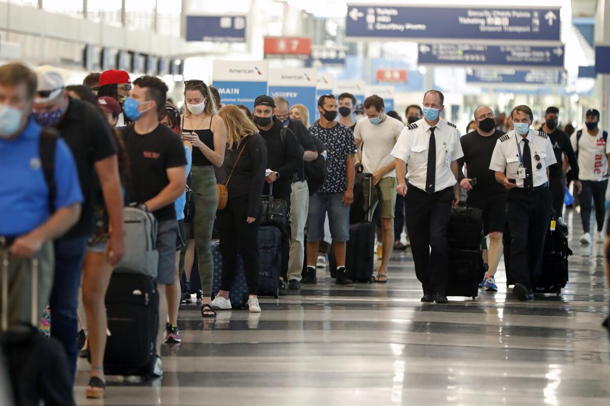 Passengers lined up for security check at O'Hare International Airport in Chicago