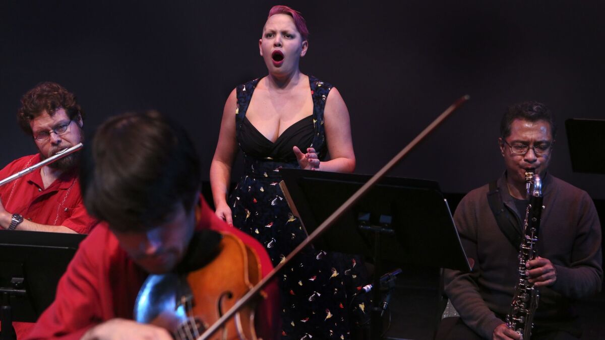 Wilfrido Terrazas, left, Alexander Bruck, Carmina Escobar and Antonio Rosales, members of the Mexican music group, Liminar, improvise before a performance at L.A.'s REDCAT in 2015,
