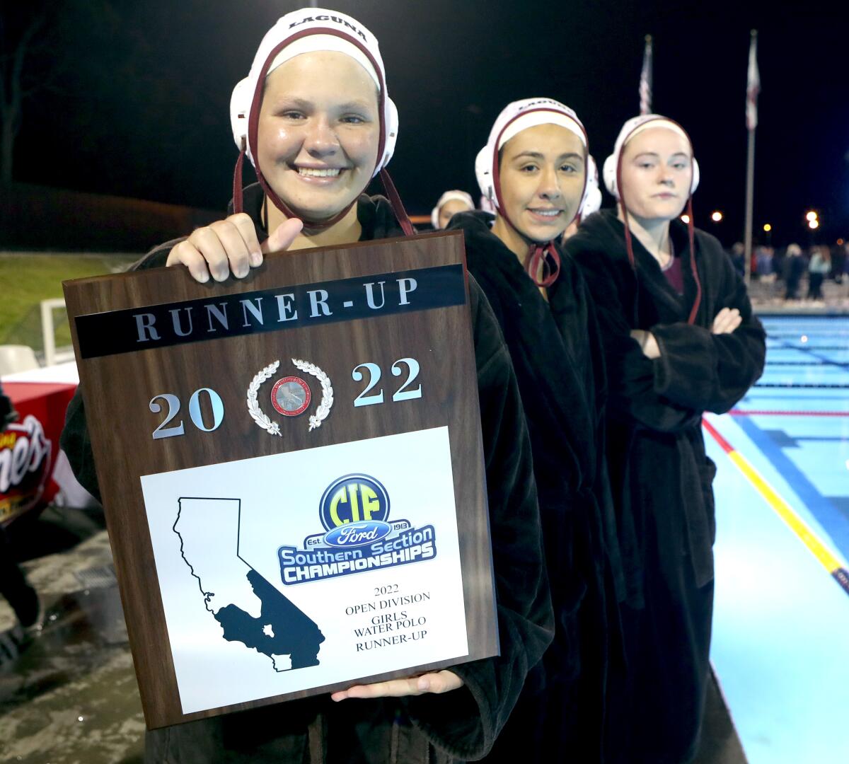 Laguna Beach shows the CIF Southern Section Open Division runner-up plaque after Saturday's match.