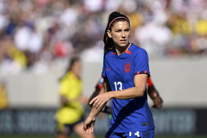 United States forward Alex Morgan looks over during the first half of an international friendly soccer match against Colombia Sunday, Oct. 29, 2023, in San Diego. (AP Photo/Alex Gallardo)