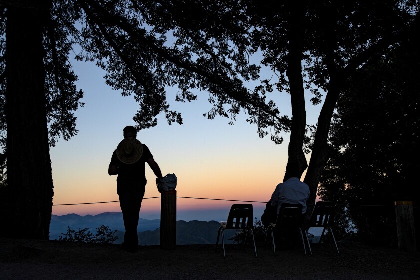 50 hikes for the Hiking Issue 2021. MT WILSON, CA - JULY 13, 2019: Visitors enjoy the view at dusk as they wait for darkness to glimpse a peak at the solar system through the 100-inch telescope at the Mt. Wilson Observatory on July 13, 2019 in Mt. Wilson, California.(Gina Ferazzi/Los AngelesTimes) Badass.
