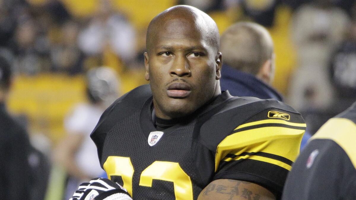 Pittsburgh Steelers linebacker James Harrison warms up before a game against the Baltimore Ravens in November 2011.