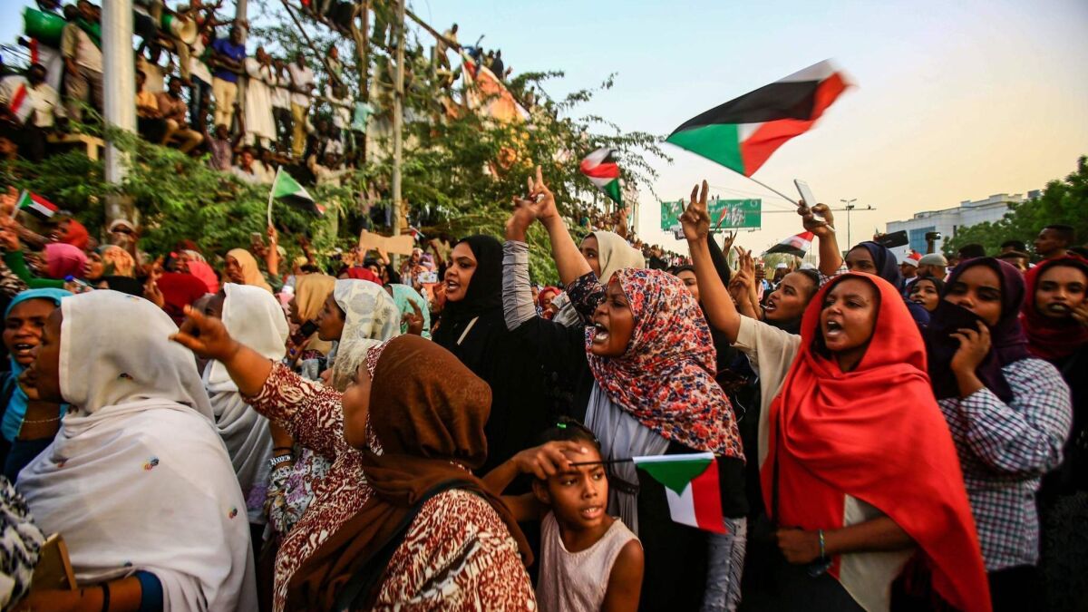 Sudanese protesters rally Friday outside the army headquarters in Khartoum, the capital.