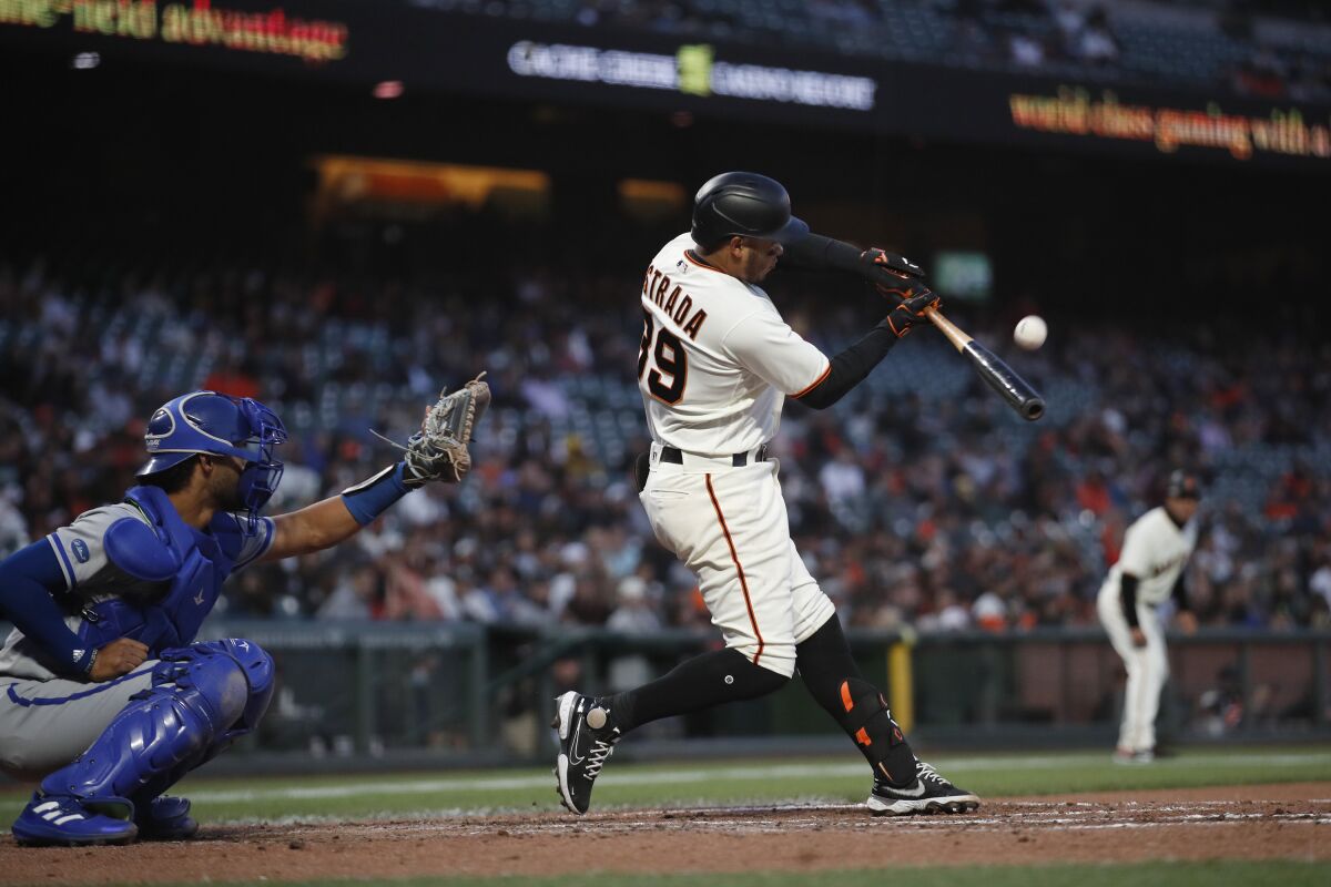 San Francisco Giants' Thairo Estrada (39) hits a single against the Kansas City Royals in the sixth inning of a baseball game in San Francisco, Monday, June 13, 2022. (AP Photo/Josie Lepe)