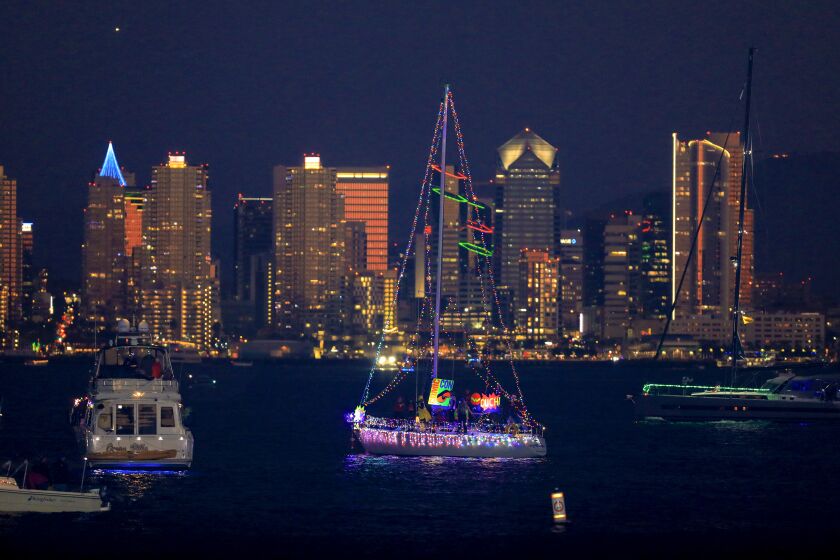 sailboats, yachts and dinghies light up San Diego Bay during the 48th annual San Diego Bay Parade of Lights. This year's theme is Comic-Con Superhero's on the bay with vessels putting on display inspired by their favorite comic books. The procession begins at Shelter Island and will continue towards Harbor Island and pass by downtown Embarcadero to the turn around point at the pier at Cesar Chavez Park and then continues to and ends near the Coronado Ferry Landing.