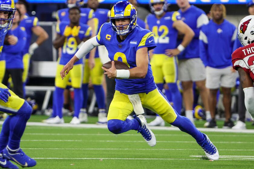 Inglewood, CA, Monday, January 17, 2022 - Los Angeles Rams quarterback Matthew Stafford (9) scrambles.