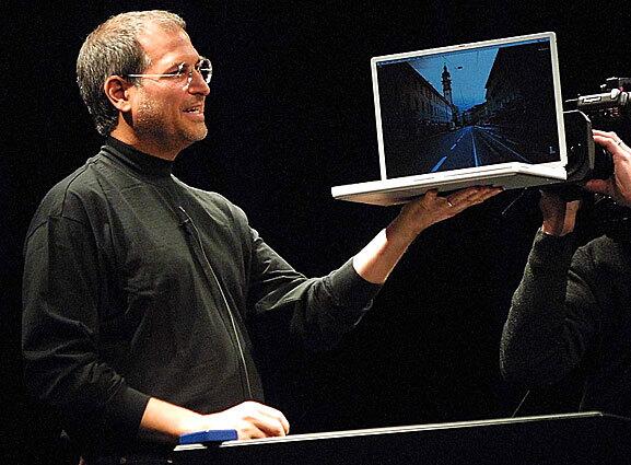 Jobs unveils a new titanium G4 Powerbook with a 15.2-inch screen at the 2000 MacWorld Expo in San Francisco. He also announced new configurations of the G4 desktop Macs as well as new audio and DVD software.