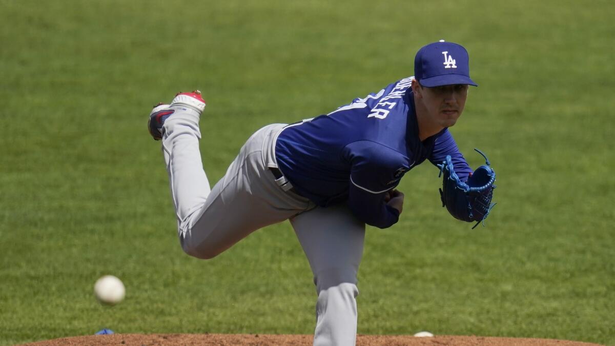 Walker Buehler throws a pitch