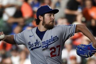 Los Angeles Dodgers starting pitcher Trevor Bauer delivers during the first inning of a baseball game against the Houston Astros, Wednesday, May 26, 2021, in Houston. (AP Photo/Eric Christian Smith)