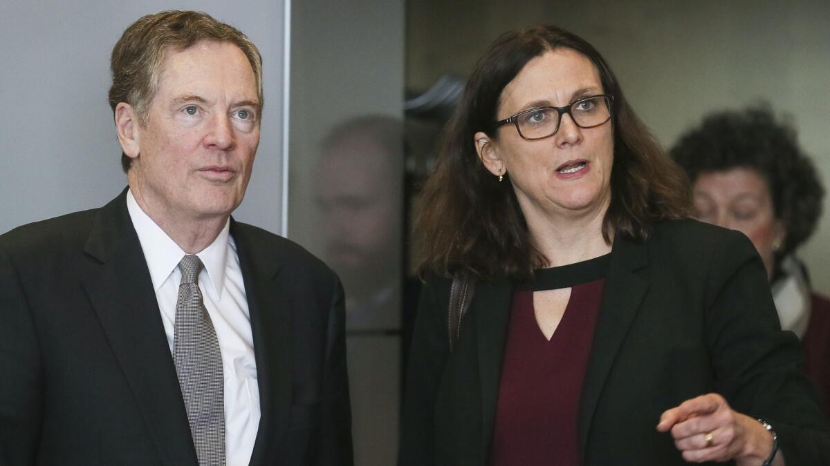 U.S. Trade Representative Robert Lighthizer, left, and European Commissioner for Trade Cecilia Malmstrom confer before a meeting at EU headquarters in Brussels on March 10.