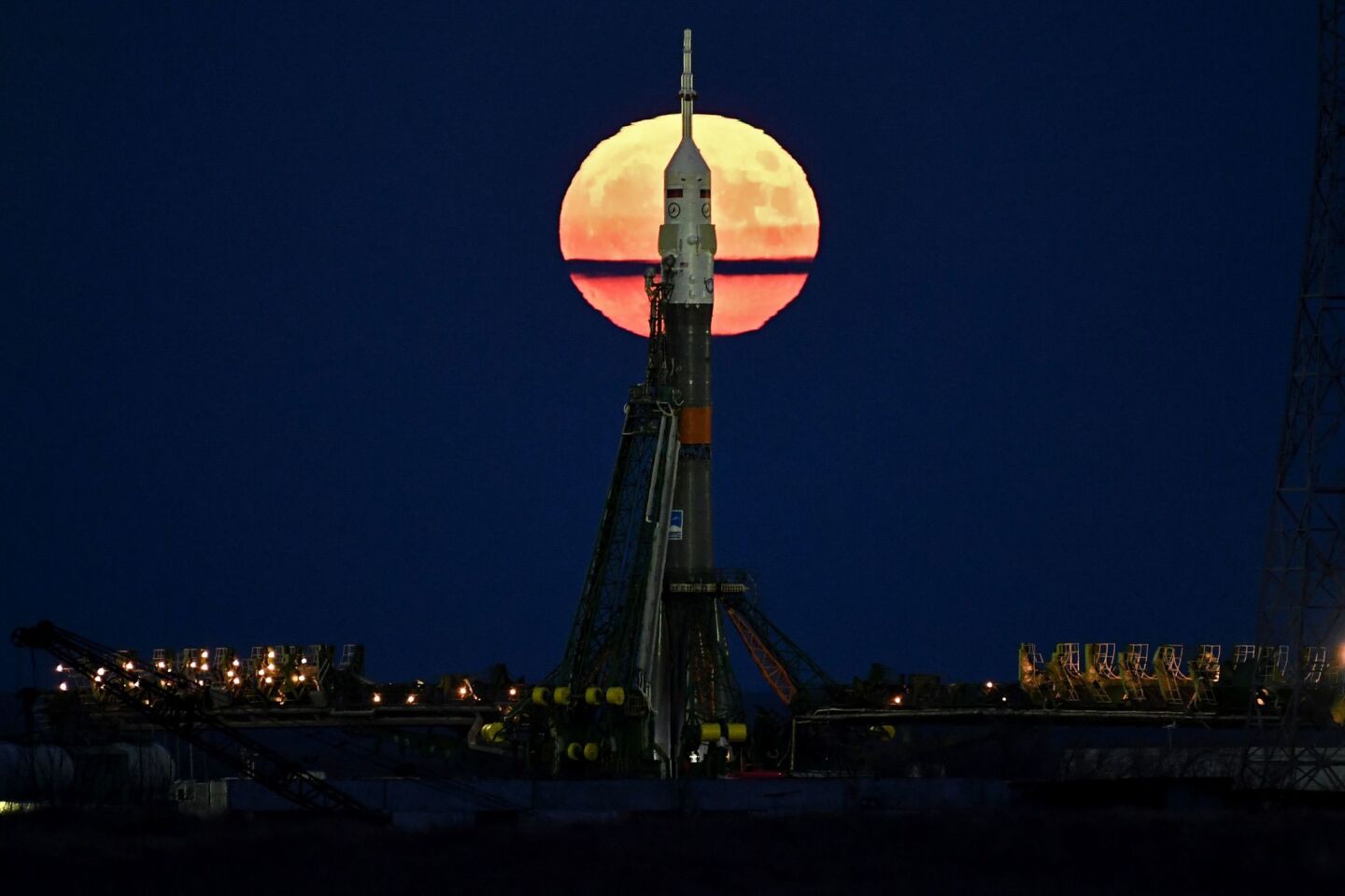 The supermoon is seen behind the Soyuz MS-03 spacecraft set on the launch pad at the Russian-leased Baikonur cosmodrome in Kazakhstan.