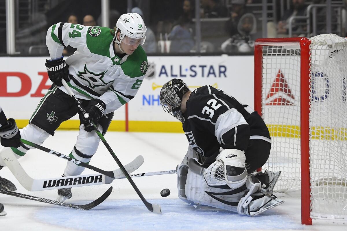 Kings goaltender Jonathan Quick stops a shot from Stars left wing Roope Hintz during the first period of a game Jan. 8 at Staples Center.
