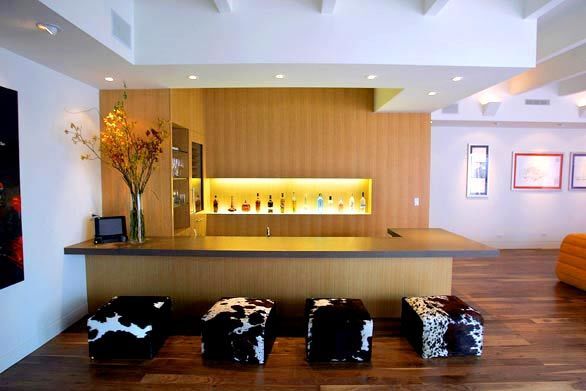 The bar, part of the expansive entertaining area downstairs that opens onto the courtyard fountain.