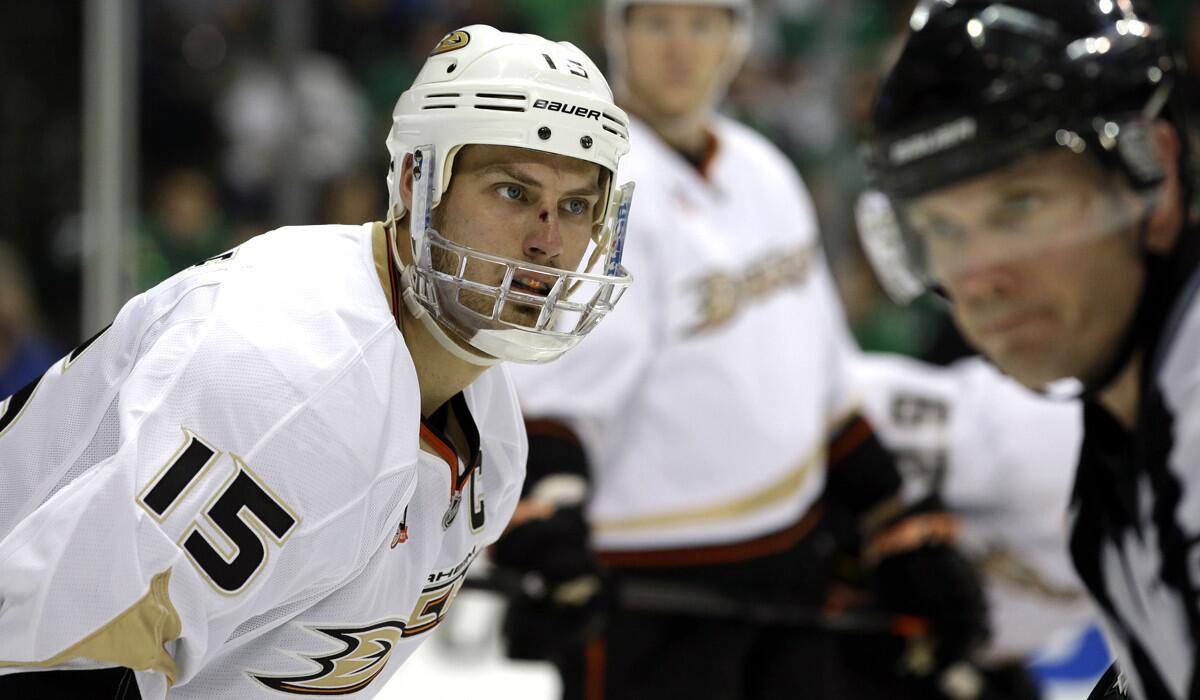 Ducks captain Ryan Getzlaf (15), preparing for a faceoff in the third period of Game 3 on Monday in Dallas, will be a game-time decision on Friday.