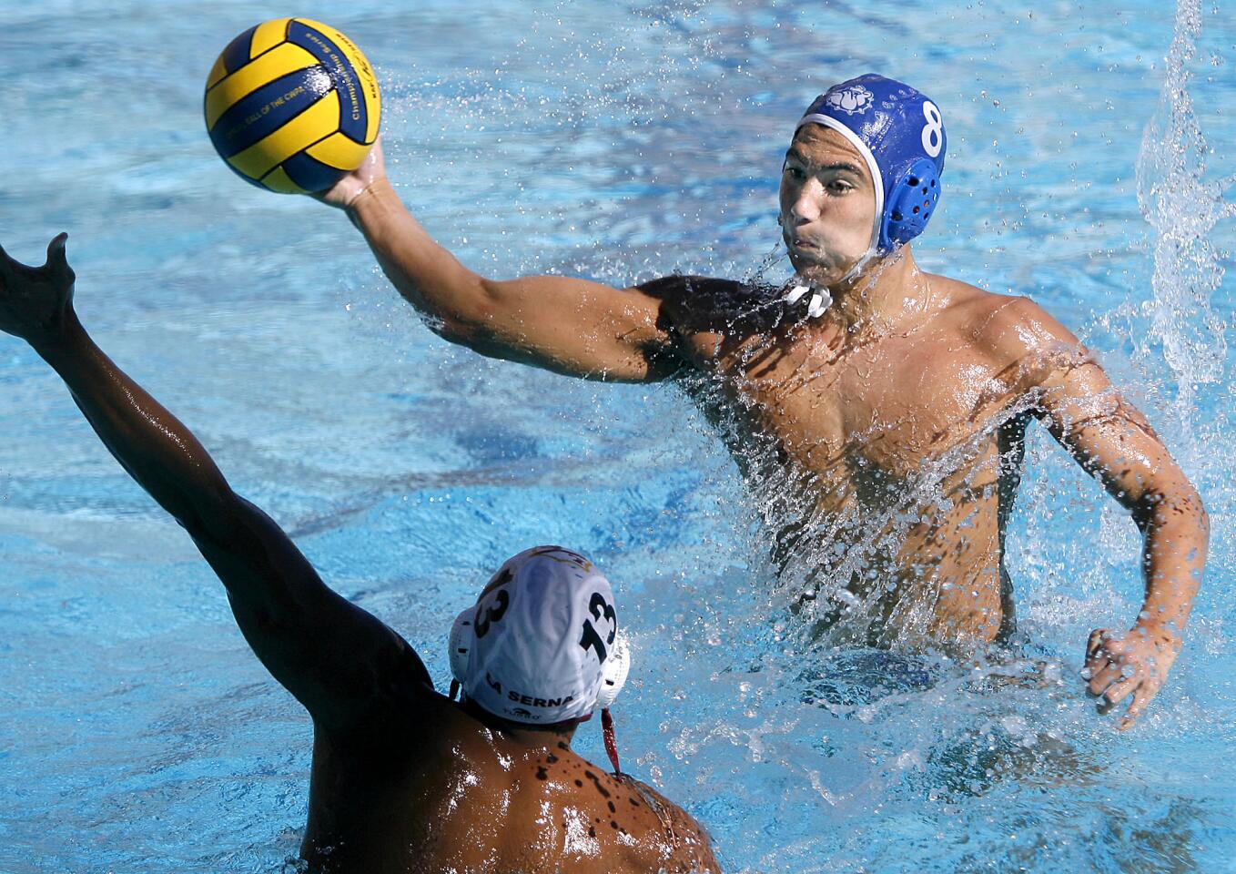 Burbank High player #8 Zack Card takes a shot on goal during CIF SS Div. V quarterfinal boys water polo game vs. La Serna High School at home in Burbank on Saturday, November 10, 2012. Burbank lost 10-14.