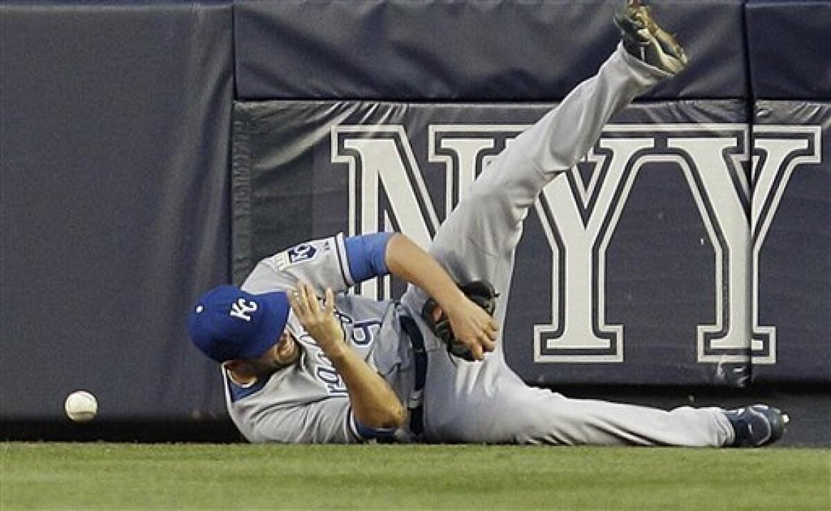 New York Yankees Derek Jeter hits an inside the park home run in the third  inning against the Kansas City Royals at Yankee Stadium in New York City on  July 22, 2010.