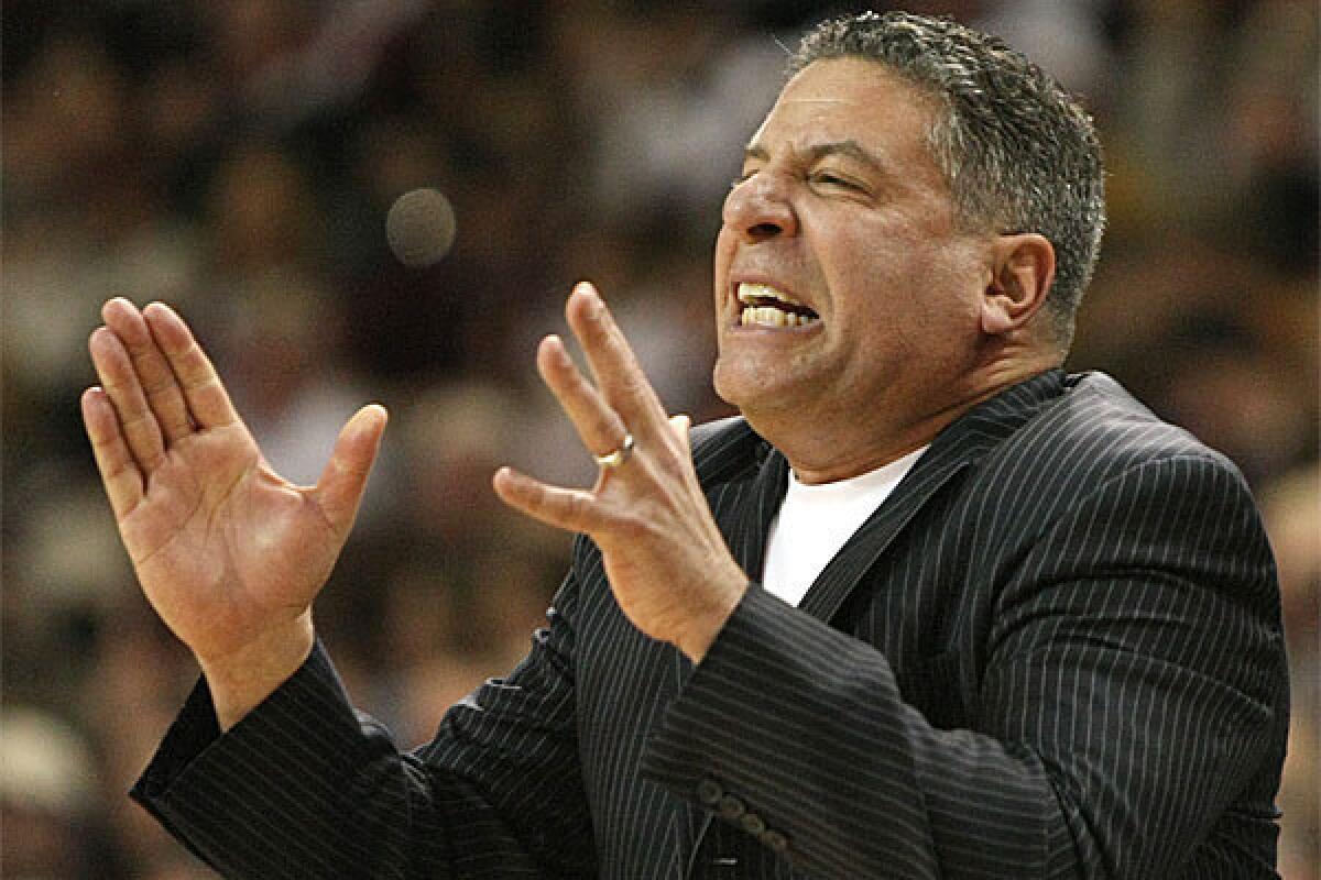 Bruce Pearl, shown with Tennessee in 2010, is the new men's basketball coach at Auburn.