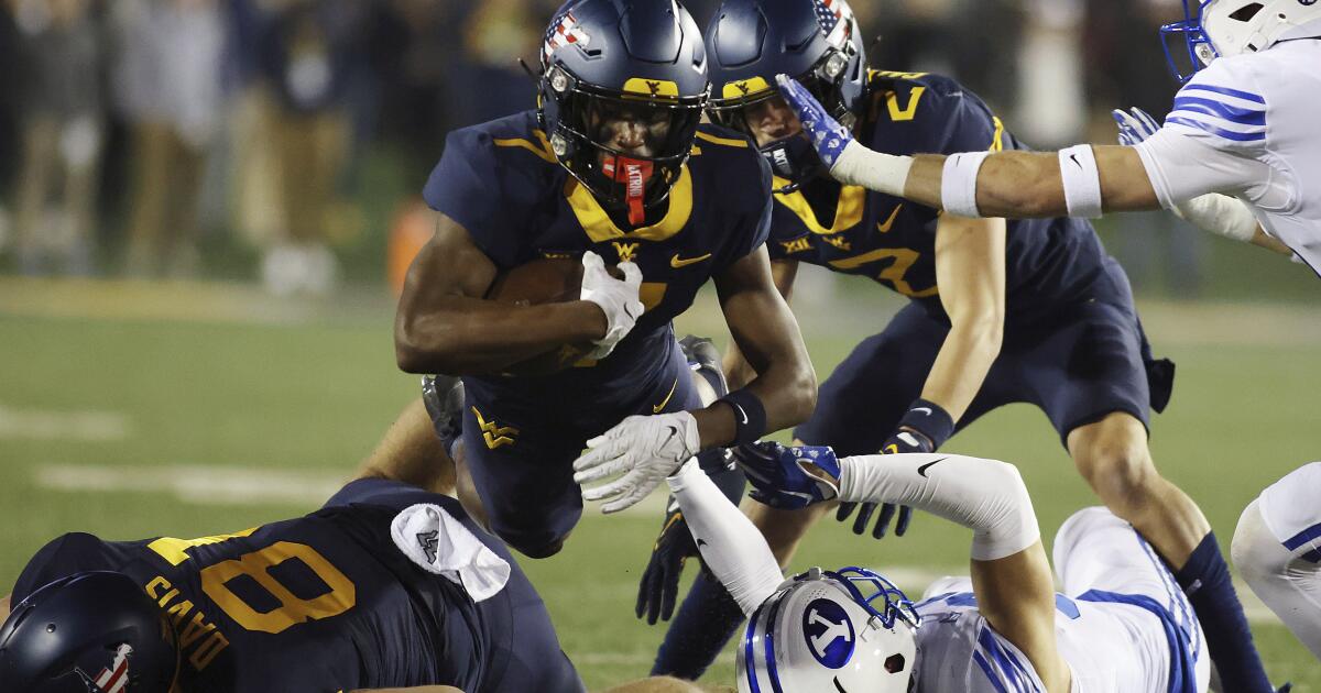 West Virginia’s Dominant Ground Attack Propels Them to a 37-7 Victory over BYU