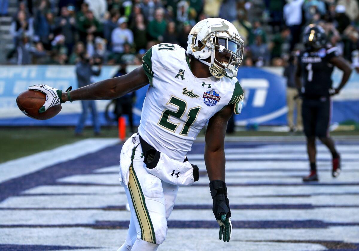 South Florida safety Khalid McGee (21) celebrates a fumble recovery against South Carolina during the second half on Dec. 29 in the Birmingham Bowl.