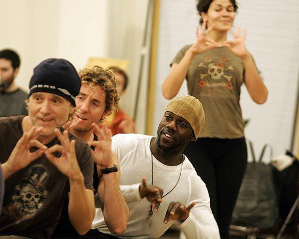 Anthony Natale, left, Aleks Pevec, Rodrick Covington and Alexandria Wailes rehearse for a production of "Pippin" that combines deaf and hearing actors, voice and American Sign Language. Deaf West Theatre is back at the Mark Taper Forum with a revival of Stephen Schwartz's sly and sensual musical.