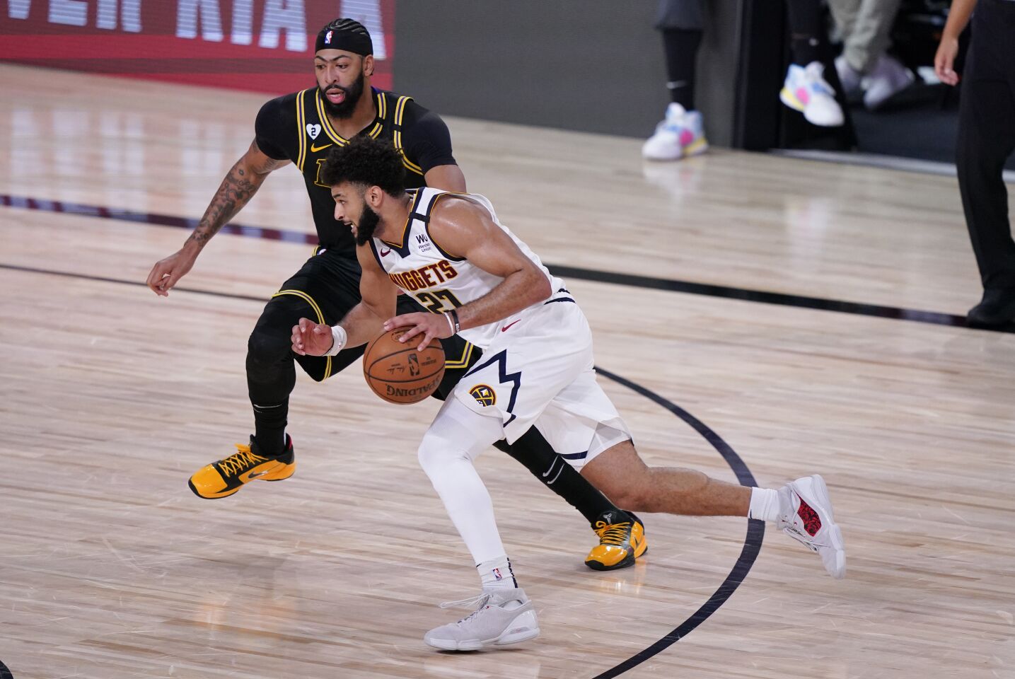 Nuggets guard Jamal Murray drives against Lakers forward Anthony Davis during Game 2.