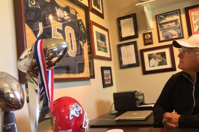 Mike Martz's desk at his San Diego home is adorned with a replica of the Lombardi Trophy he won as offensive coordinator of the “Greatest Show on Turf” Rams.