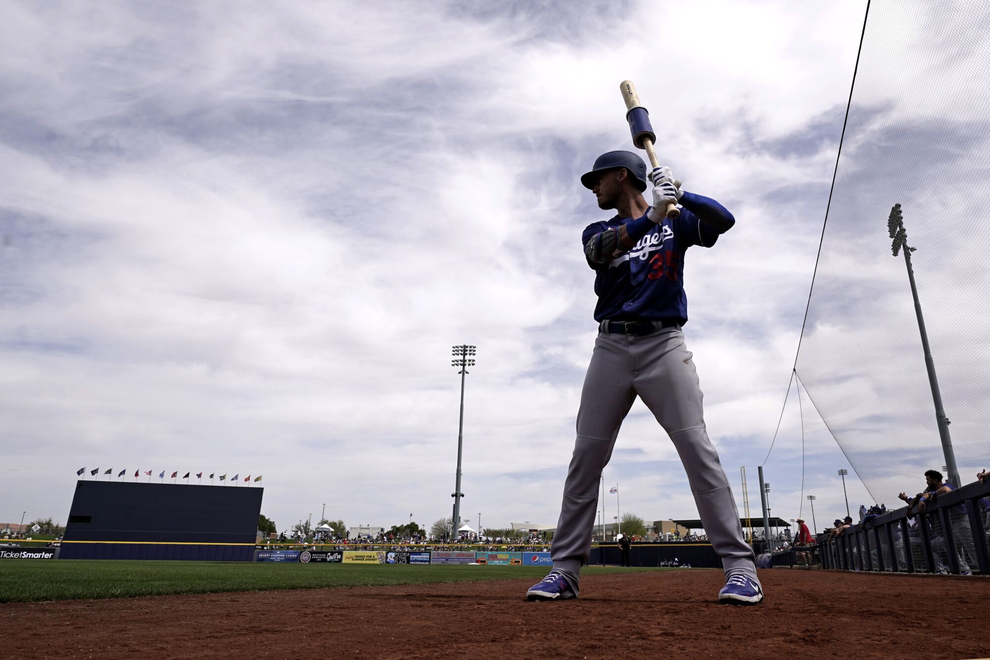 Cody Bellinger warms up during a spring game against the Seattle Mariners on March 19.