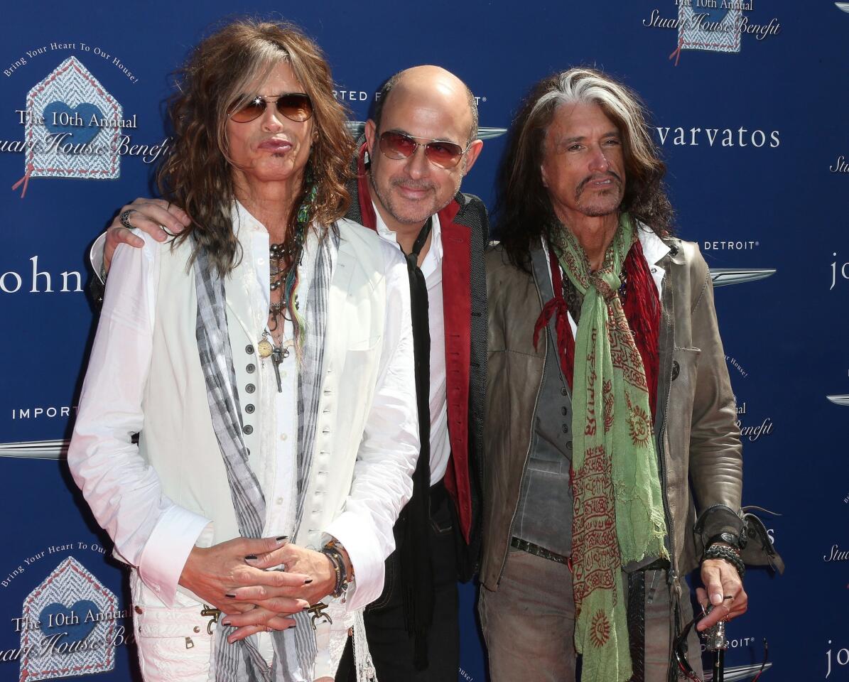 From left, recording artist Steven Tyler, fashion designer John Varvatos and recording artist Joe Perry.