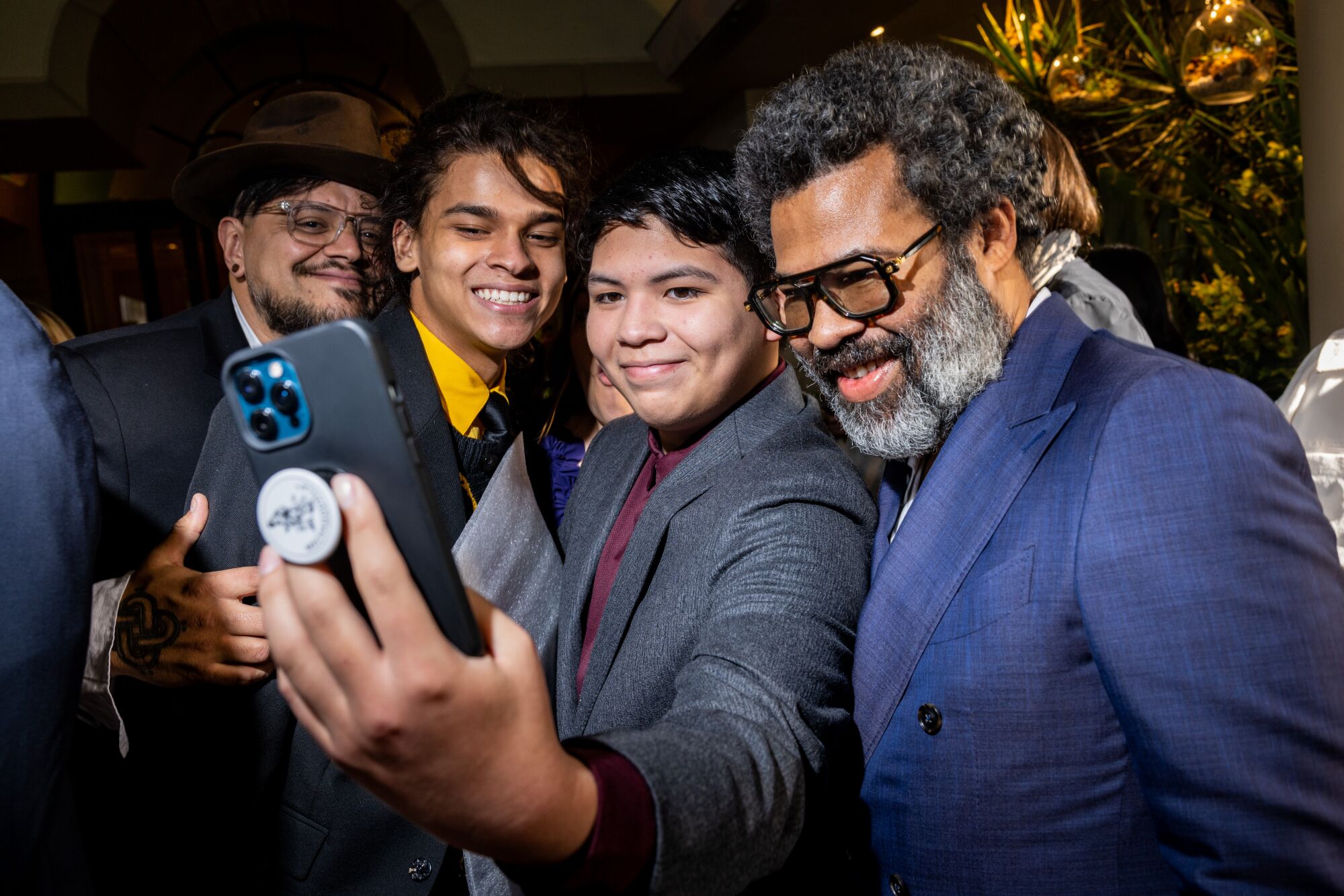 Director Jordan Peele (right), from left to right: Stalin Harjo, Dafarao Unatai, and Lane Factor.